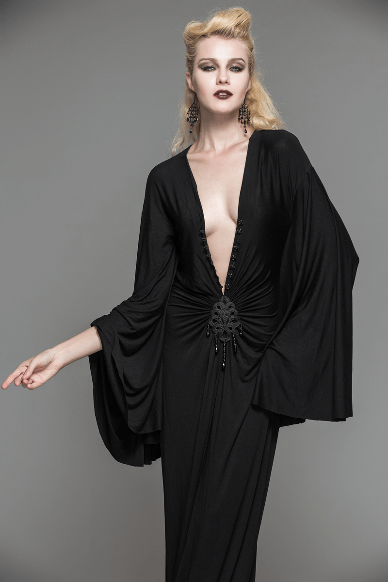 Elegant gothic black dress with deep V-neck and wide sleeves, featuring detailed decor at the waist.