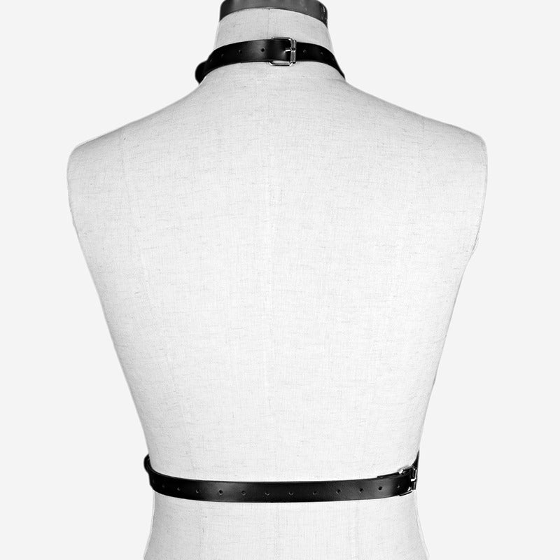 Back view of a stylish women's leather body harness in black, ideal for goth or alternative fashion.