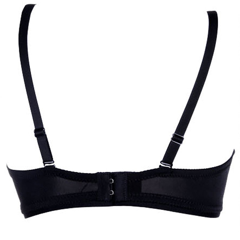 Back view of a sexy black rhinestone and spike bra, perfect for a rock-inspired wardrobe.