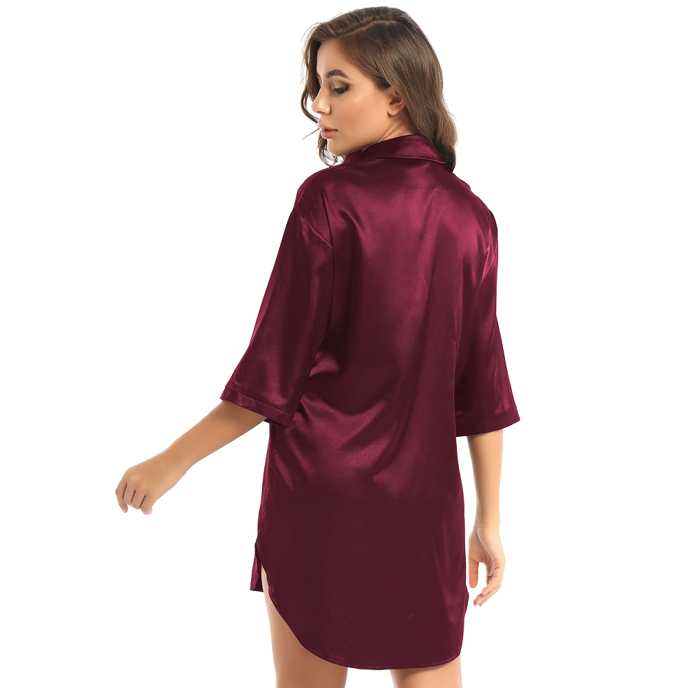 Stylish woman wearing a sexy burgundy satin shirt with 3/4 sleeves, showcasing a comfortable casual look.