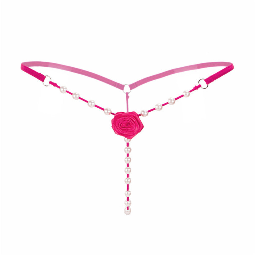 Attractive pink G-string thong with floral design and pearl beads for a bold intimate look.