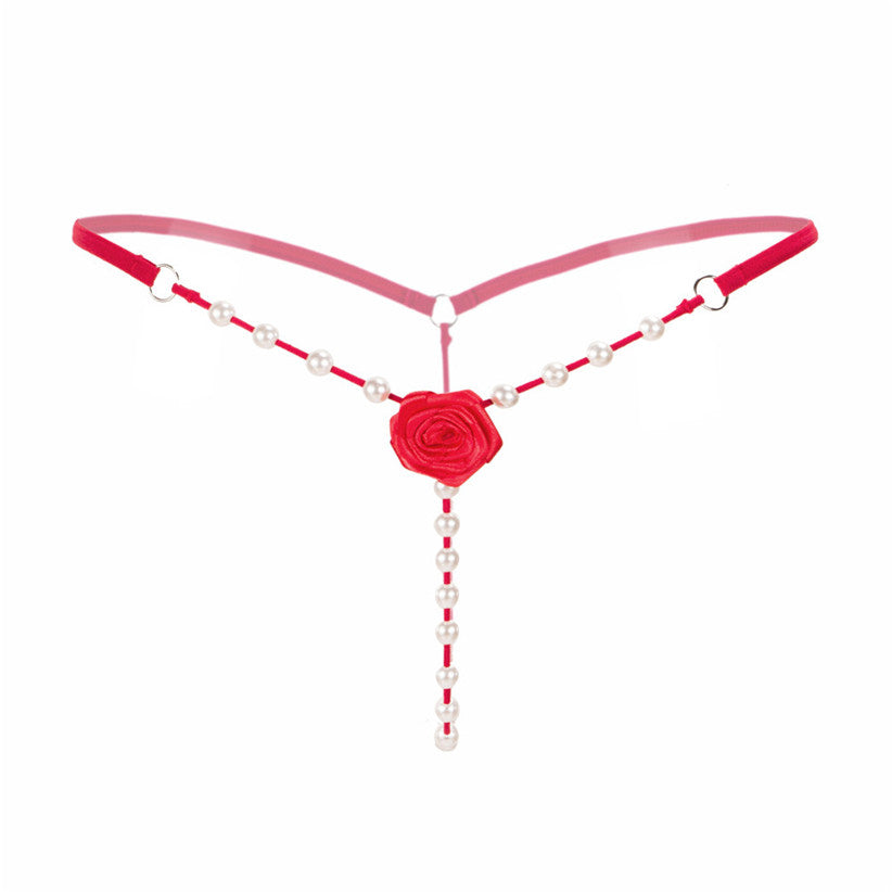 Sexy women's beaded G-string thong with a rose flower, perfect for intimate outfits.