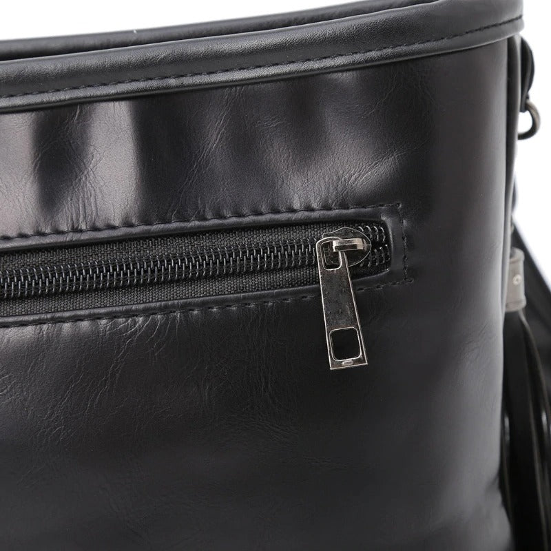 Close-up of a stylish black imitation leather shoulder bag zipper, perfect for rock-style outfits.