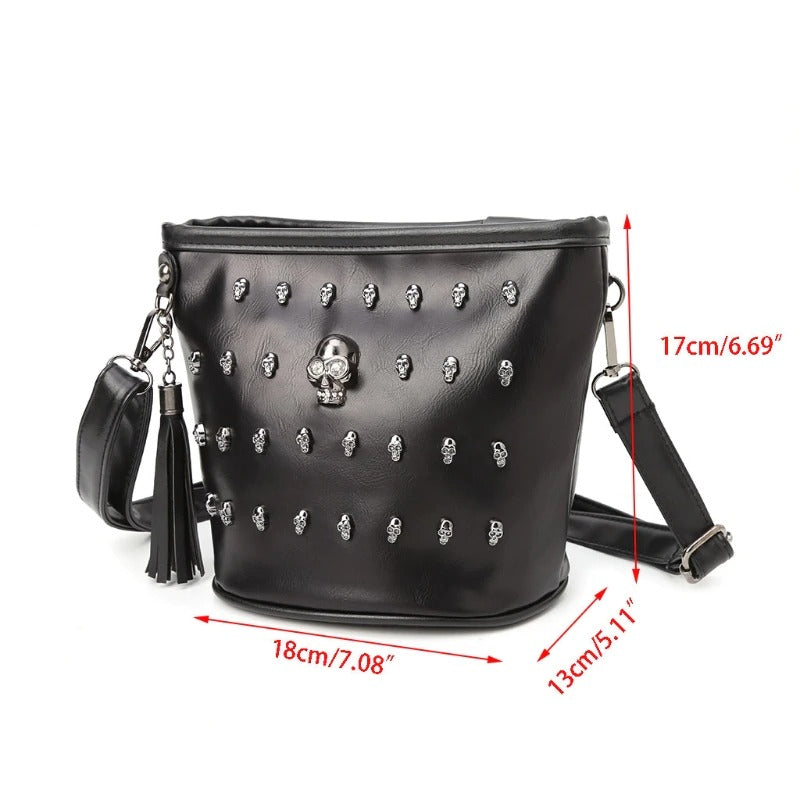 Edgy women's shoulder bag in black imitation leather with skulls, perfect for rock style outfits.