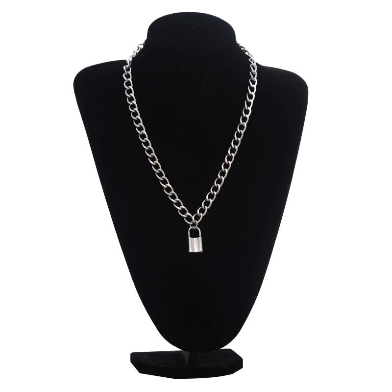 Silver chain necklace with gothic padlock pendant displayed on a black bust, perfect for alternative fashion.