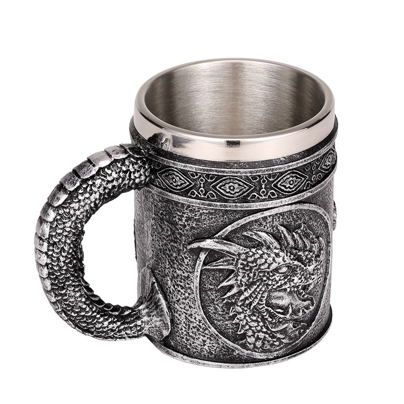 Vintage silver resin and stainless steel beer mug with dragon head design, perfect for retro Viking pub style.