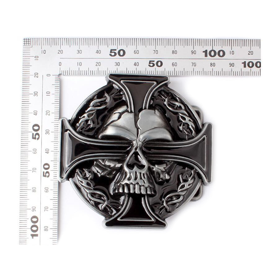 Rock-style metal skull cross belt buckle with intricate design and measurements for size reference.