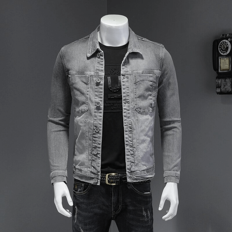 Men's slim fit gray denim jacket with turndown collar, styled for a casual look.