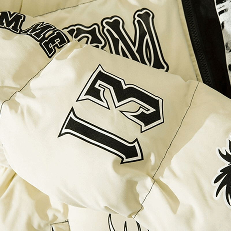 Close-up of a stylish hooded jacket featuring bold black print designs on a cream background, perfect for punk fashion.