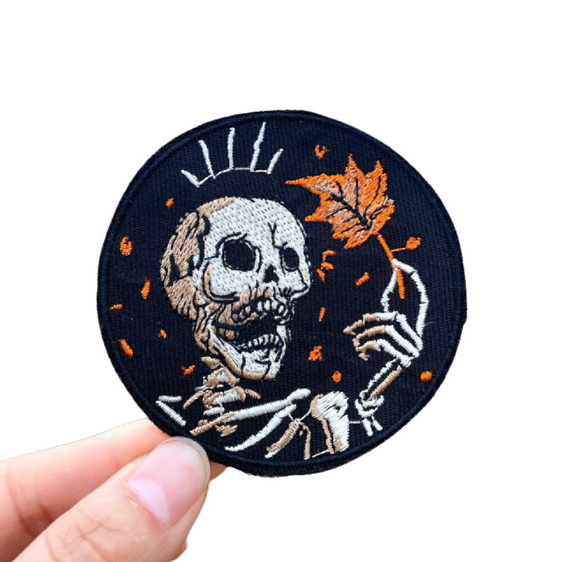 Skeleton with maple leaf iron-on patch, rock style embroidery for trendy clothing accessories.