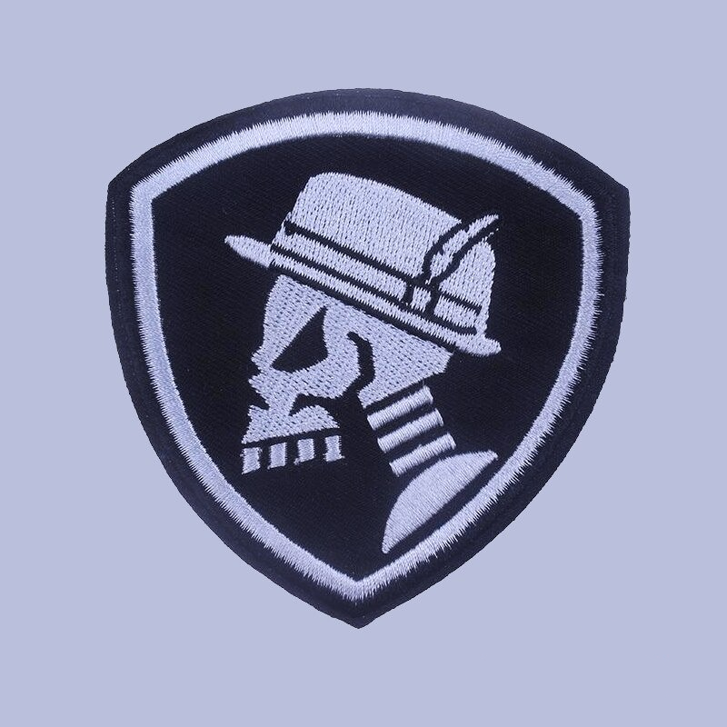 Skull and hat fusible patch on a shield background, a trendy rock accessory for jackets and bags.