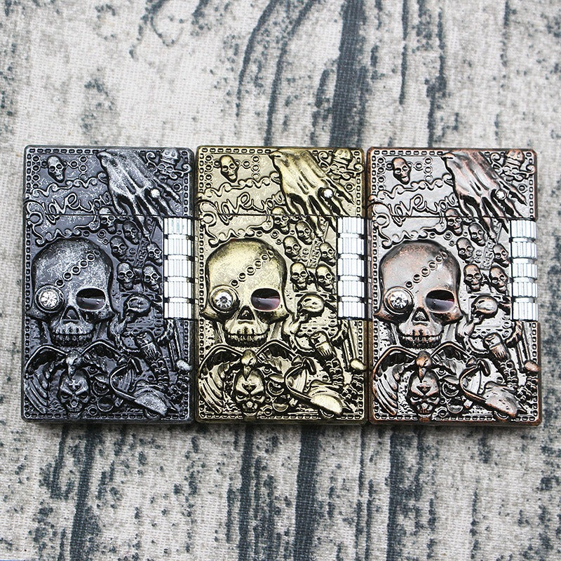 Unique skull gas lighters in three colors, a must-have accessory for rocker fashion lovers. Perfect for any metal style outfit!