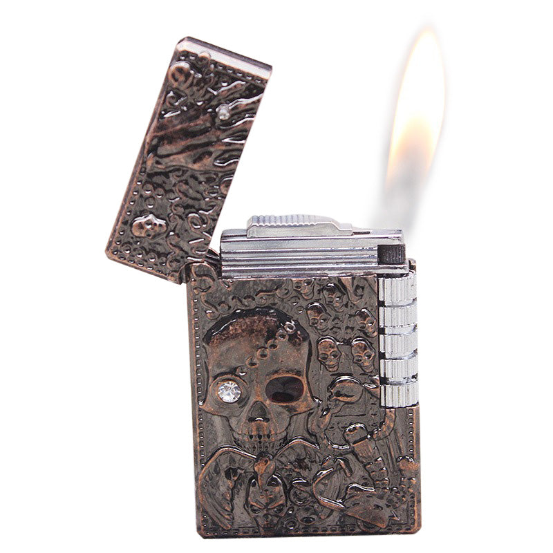Skull gas lighter with intricate design, perfect for rocker fashion enthusiasts and heavy metal style.