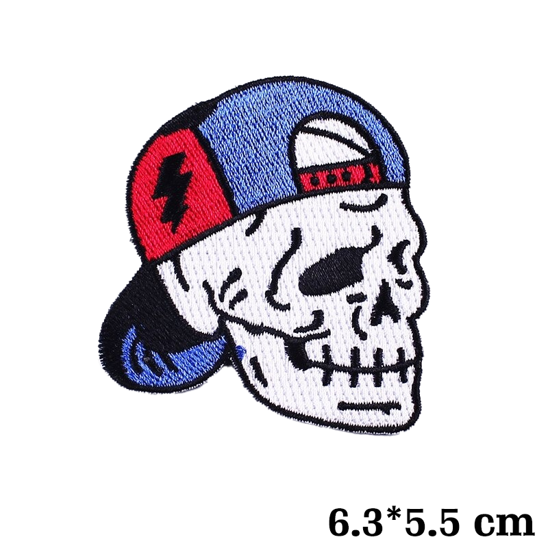 Skull patch with blue baseball cap, perfect for stylish jackets and bags, adding a rocker vibe to your outfit.