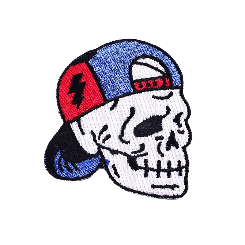 Skull patch with blue baseball cap, perfect for jackets and bags, adds rock style to outfits, unisex accessory.