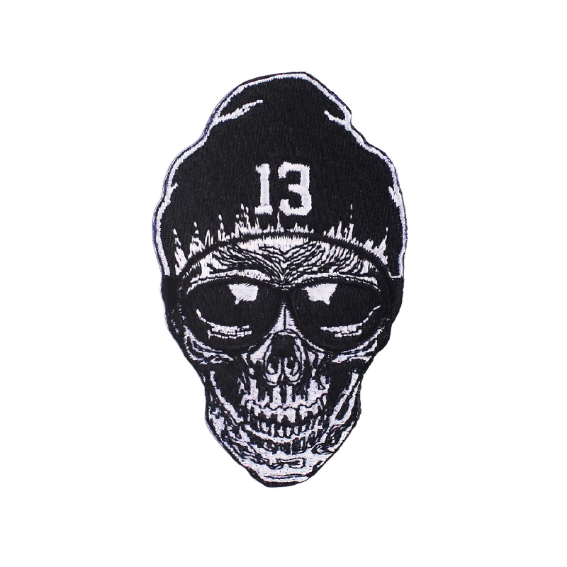 Skull patch with sunglasses and beanie, edgy unisex accessory for alternative fashion lovers.