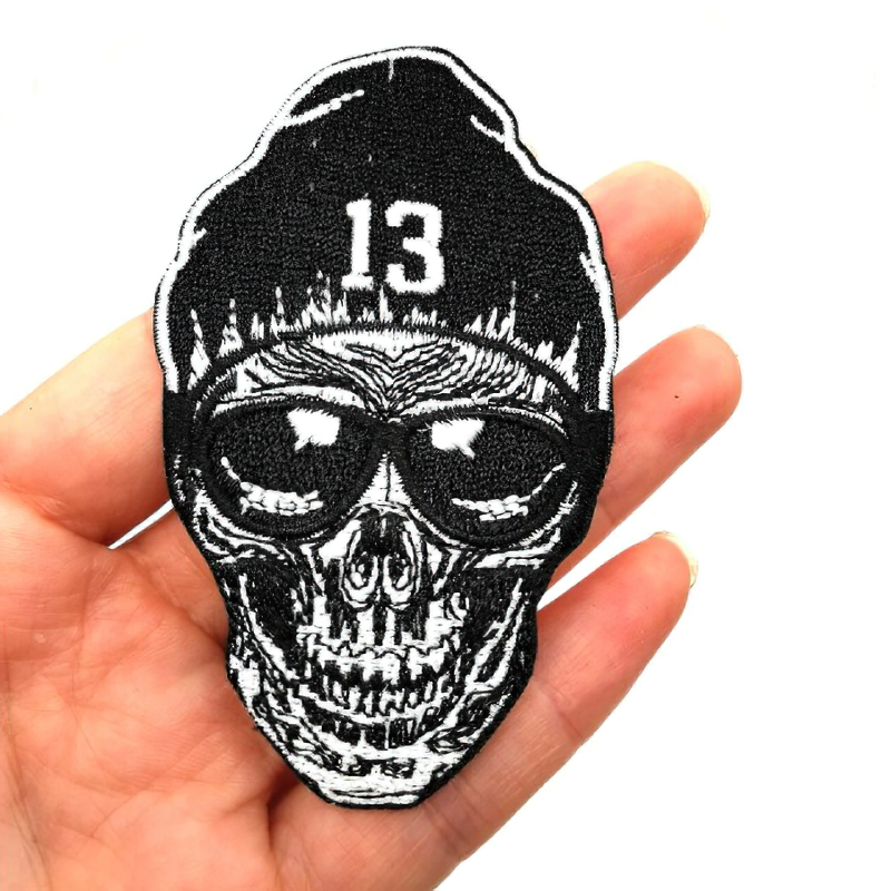 Unisex skull patch with glasses and beanie, perfect alternative fashion accessory for clothing.