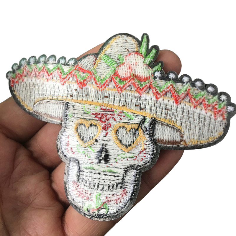 Gothic skull patch in a colorful Mexican hat, perfect for stylish unisex clothing accessories.