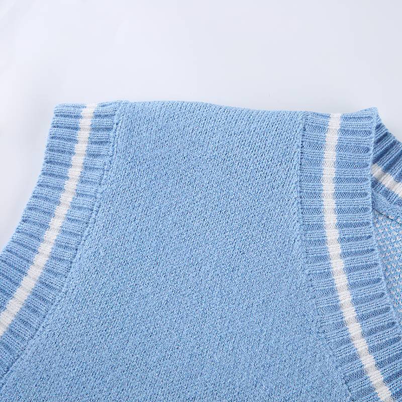 Close-up of a light blue sleeveless top with white striped trim, showcasing soft acrylic fabric for summer style.