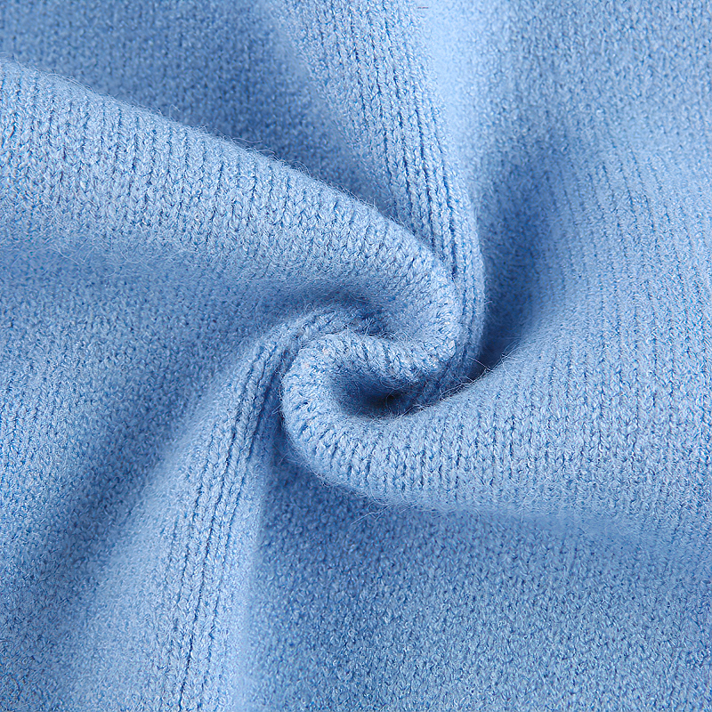Close-up of soft blue acrylic fabric, perfect for stylish summer tops with a comfy texture.