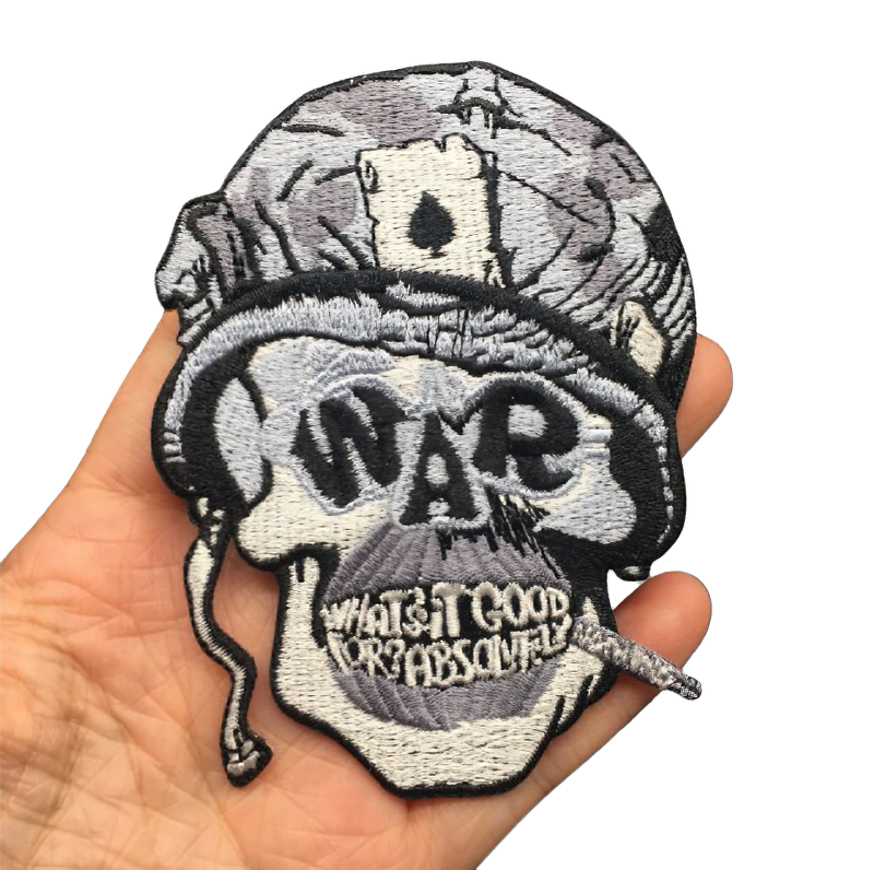 Skull patch with war theme, a unique unisex accessory for jackets and bags, adding edgy style.
