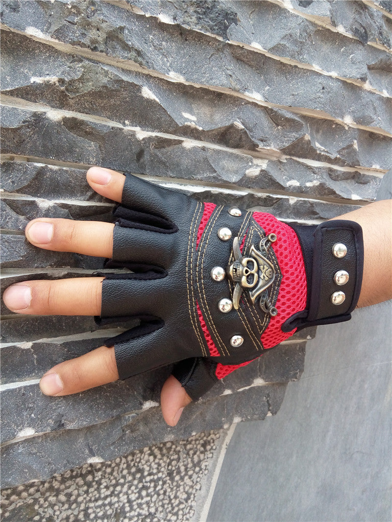 Half finger skull gloves with rivets and pirate detail, perfect for alternative fashion and cosplay events.