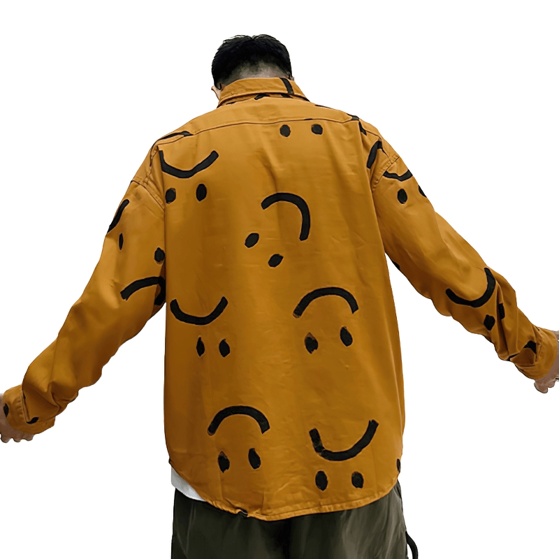 Men's trendy cotton shirt with smiley face print in orange, showcasing casual long sleeves and relaxed fit.
