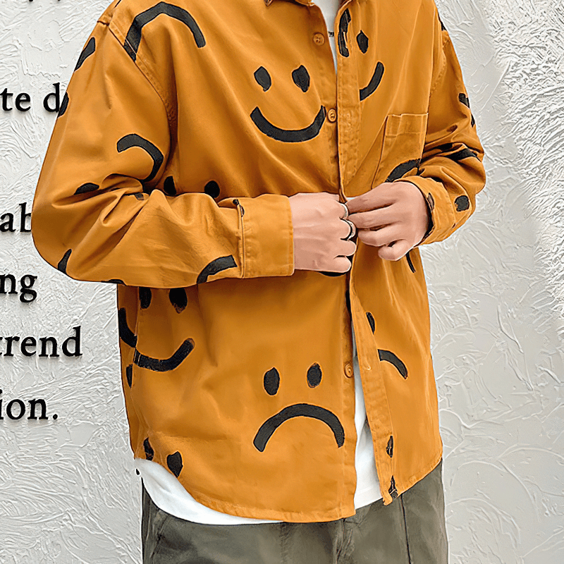 Men's trendy cotton shirt with smiley print in warm orange, perfect for casual outfits and stylish comfort.