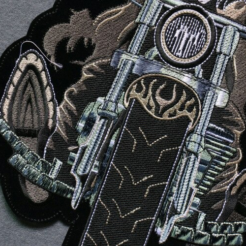 Colorful iron-on smiling skeleton biker patch design for jackets and bags, large embroidered style accessory.