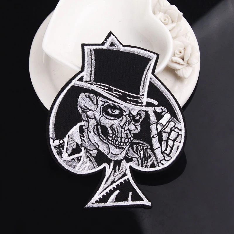 Smiling skull in a vintage hat design for clothing patch, perfect for unisex rave outfits and accessories.