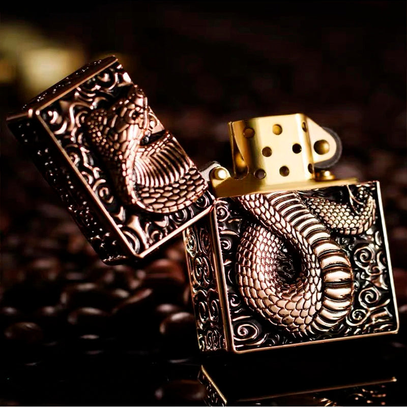 Snake design gasoline lighter with intricate metal relief, perfect for stylish smokers. A unique and functional gift.