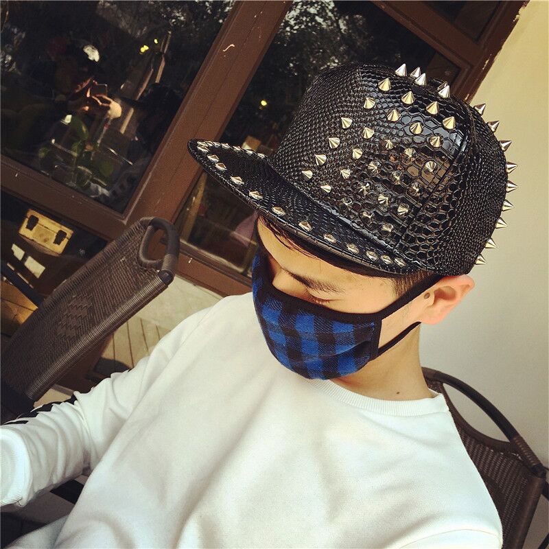 Snakeskin rock style cap with studs, edgy punk clothing, perfect for adding a daring touch to any outfit.