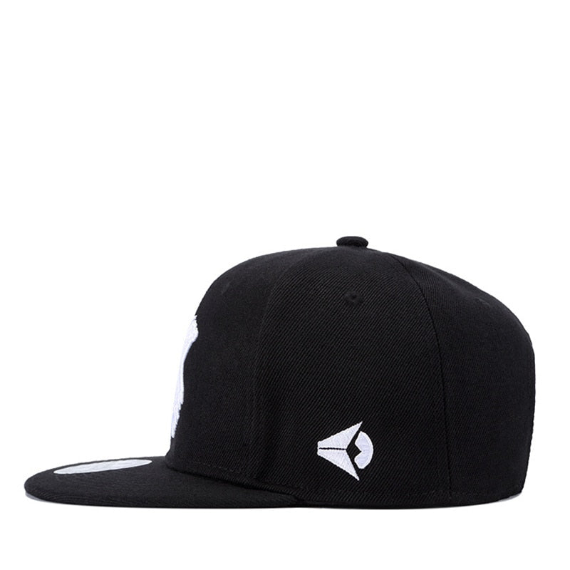 Stylish black snapback cap with flat brim, perfect for casual outings and festivals, suitable for men and women.