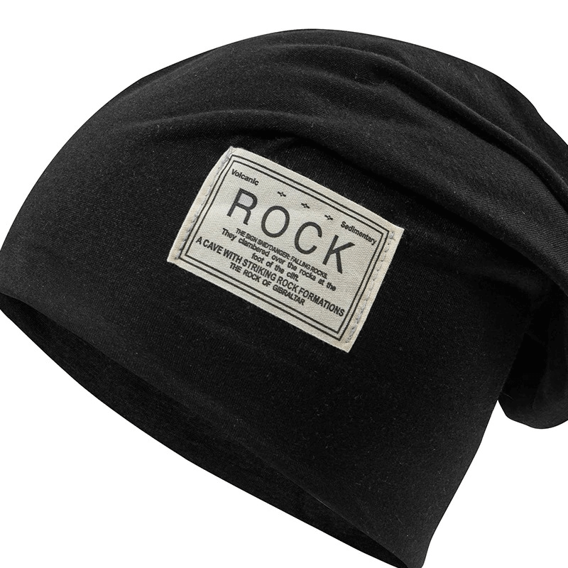 Stylish black beanie hat with 'ROCK' embroidery label, perfect for casual outdoor wear and staying warm.