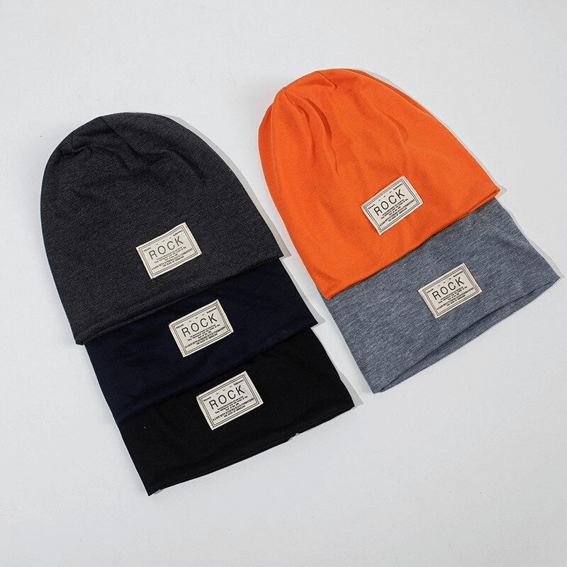 Colorful collection of stretch beanie hats with stylish labels, perfect for warm outdoor fashion and casual wear.