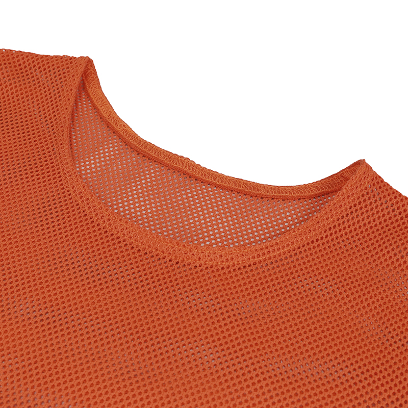Close-up of soft stretchy orange mesh top for women, showcasing the breathable fabric and round neckline.