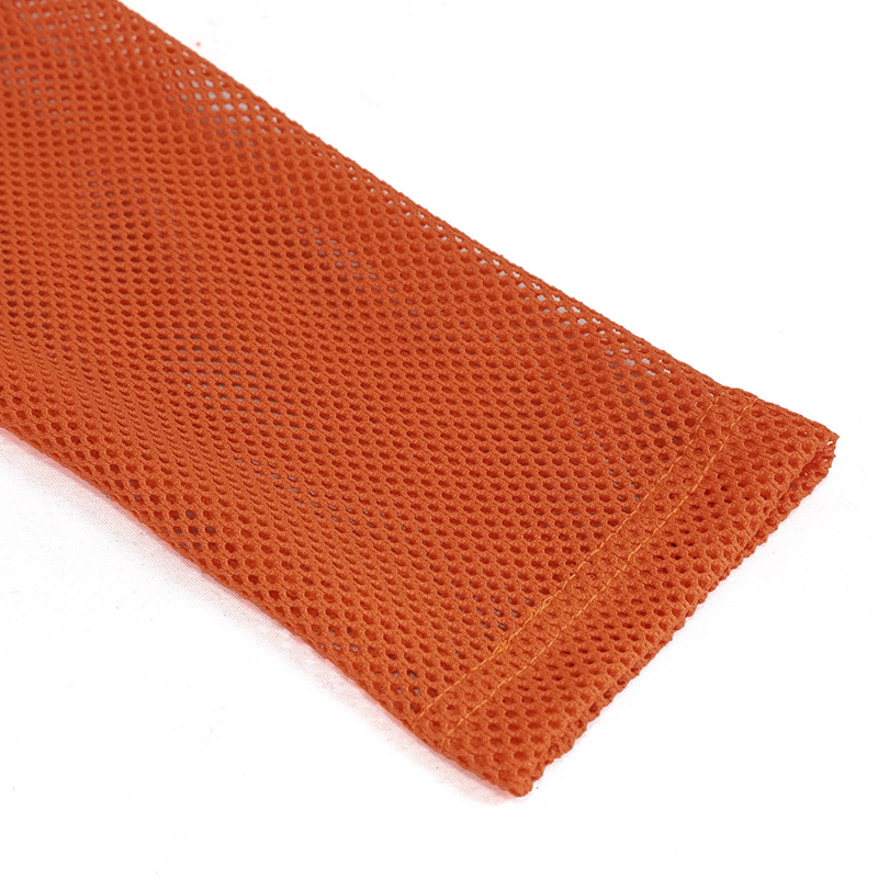 Close-up of soft stretchy orange mesh fabric showcasing its texture, perfect for women's alternative style clothing.