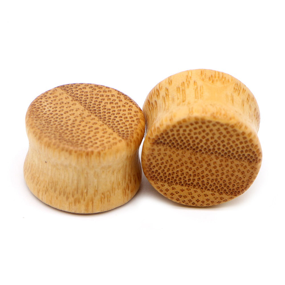 Solid bamboo wood ear plugs set - stylish and comfortable gauges for any taste, perfect for body jewelry enthusiasts.