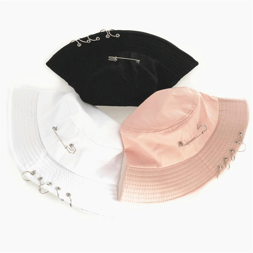 Unisex solid color bucket hats with pin rings, showcasing black, white, and pink styles for a trendy punk fashion look.