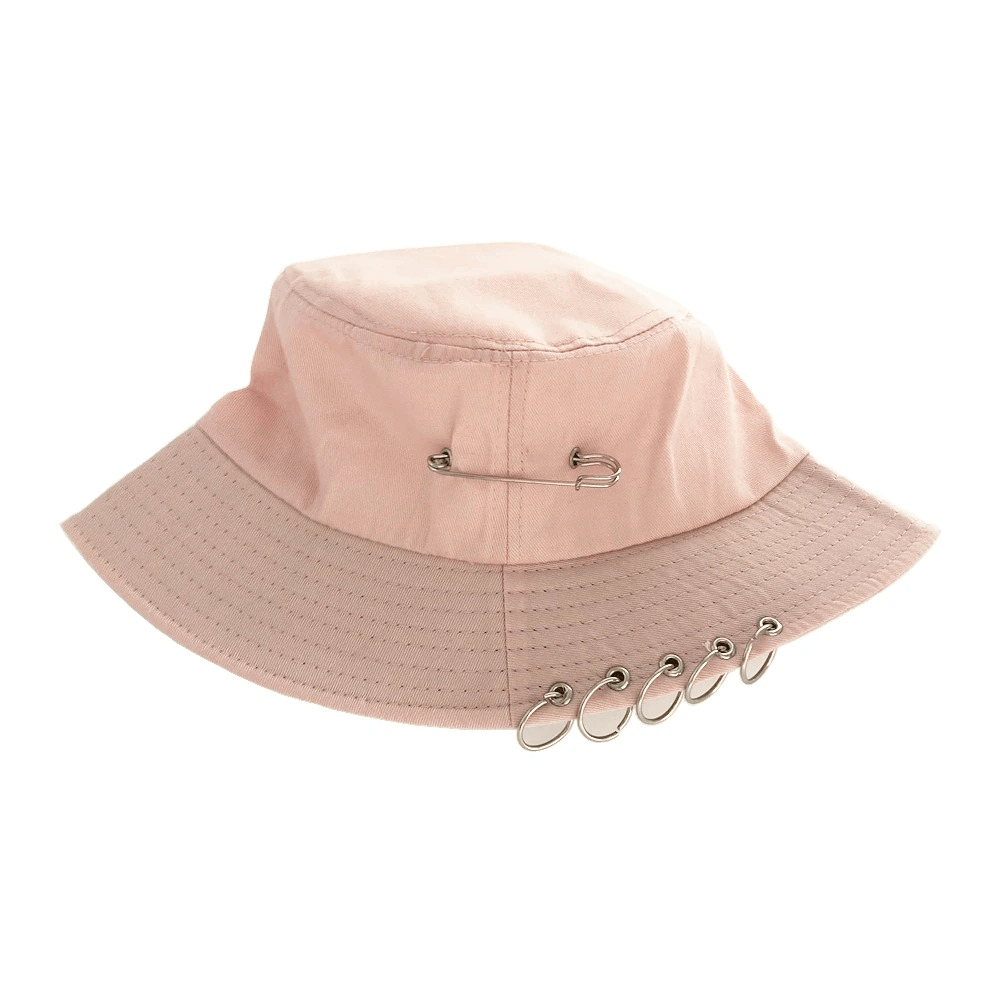 Unisex solid color cotton bucket hat in pink with punk-style pin rings for a trendy fashion statement.