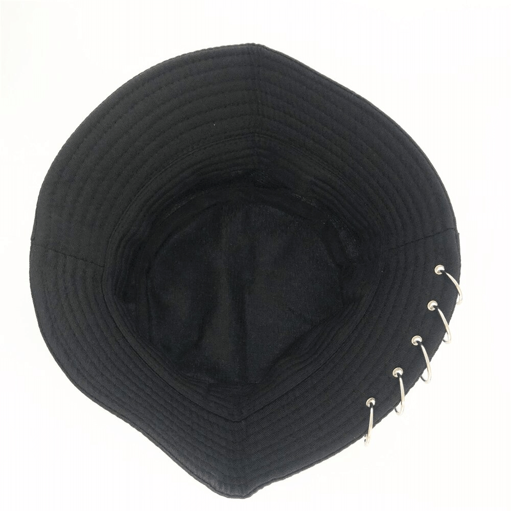 Inside view of a solid black unisex cotton bucket hat featuring stylish pin rings, perfect for punk fashion enthusiasts.