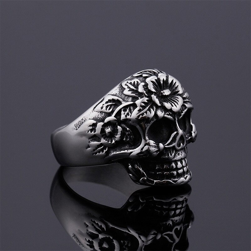Vintage silver-color skull ring with flower patterns, perfect for rock punk jewelry lovers. Size options 7-12.