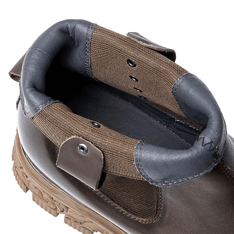 Close-up view of soft leather pull-on ankle boots showcasing the inner lining and design details.