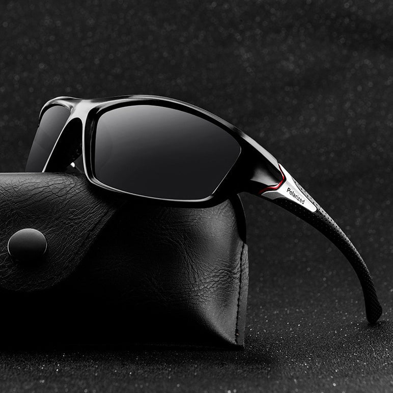 Sport polarized sunglasses on a black leather case, UV400 eyewear for men and women, perfect for outdoor activities.