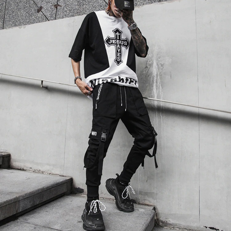 Men's spring fashion pants in black with unique designs and ribbons, perfect for a rock-style look.