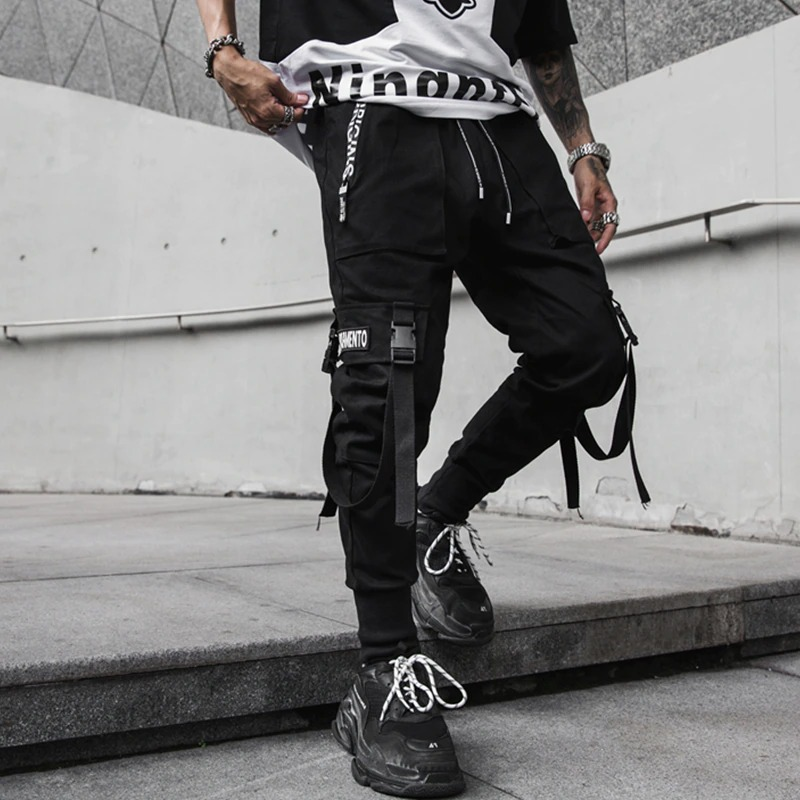 Spring fashion pants for men in black with stylish ribbons, perfect for active days and rock style enthusiasts.
