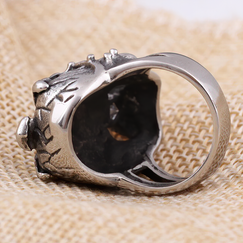 Stainless steel anarchy skull ring with crystal, showcasing unique gothic design and detailed craftsmanship.