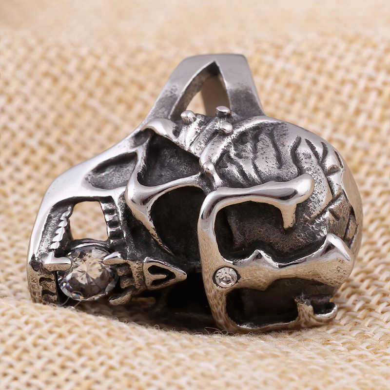 Stainless steel skull ring with crystal, perfect for gothic, punk, or biker styles, showcasing a unique design.