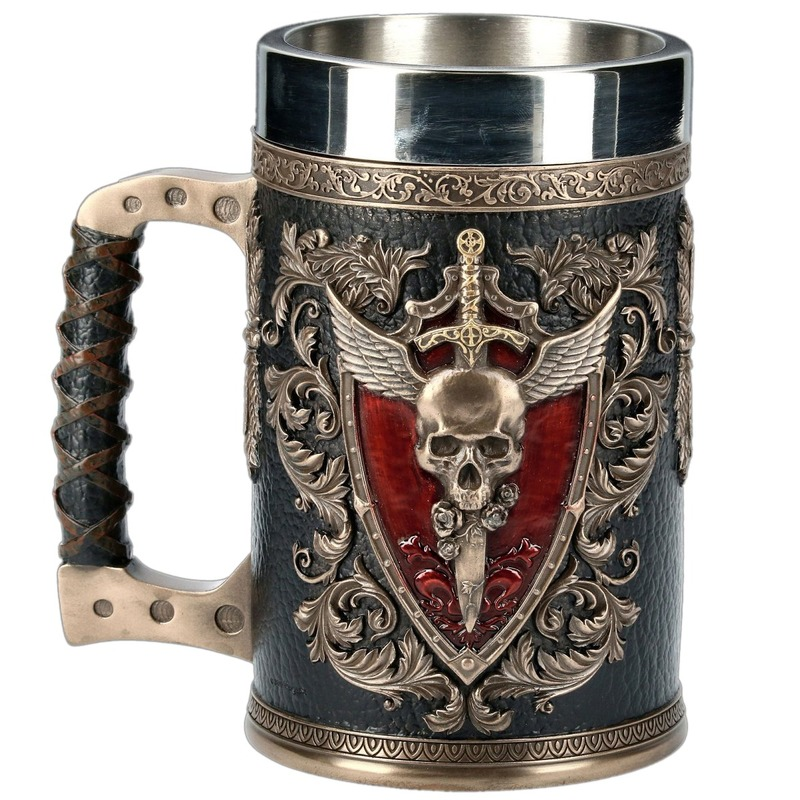Vintage stainless steel and resin beer mug with skull, sword, and shield design, perfect for collectors.
