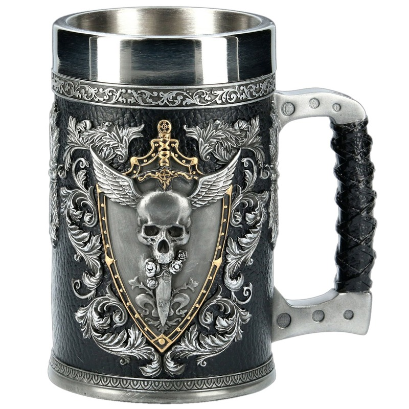 Vintage stainless steel and resin beer mug featuring a skull, floral design, and winged sword and shield.